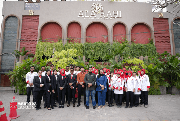 Culinary students learning during visit to Ala Rahi restaurant outside classroom